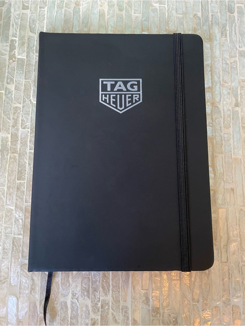 Tag Heuer Black Hardcover Notebook with Silver Logo and Elastic